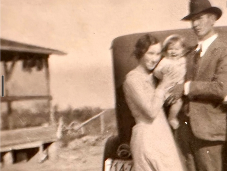 Parents holding baby daughter