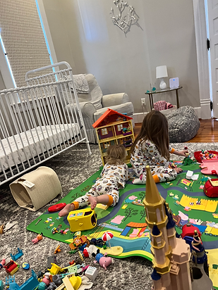 Kids playing while a coastal Nanny is supervising