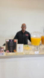 TopShelfTipsy bartender at juice and cocktail station during a corporate event in Philadelphia with