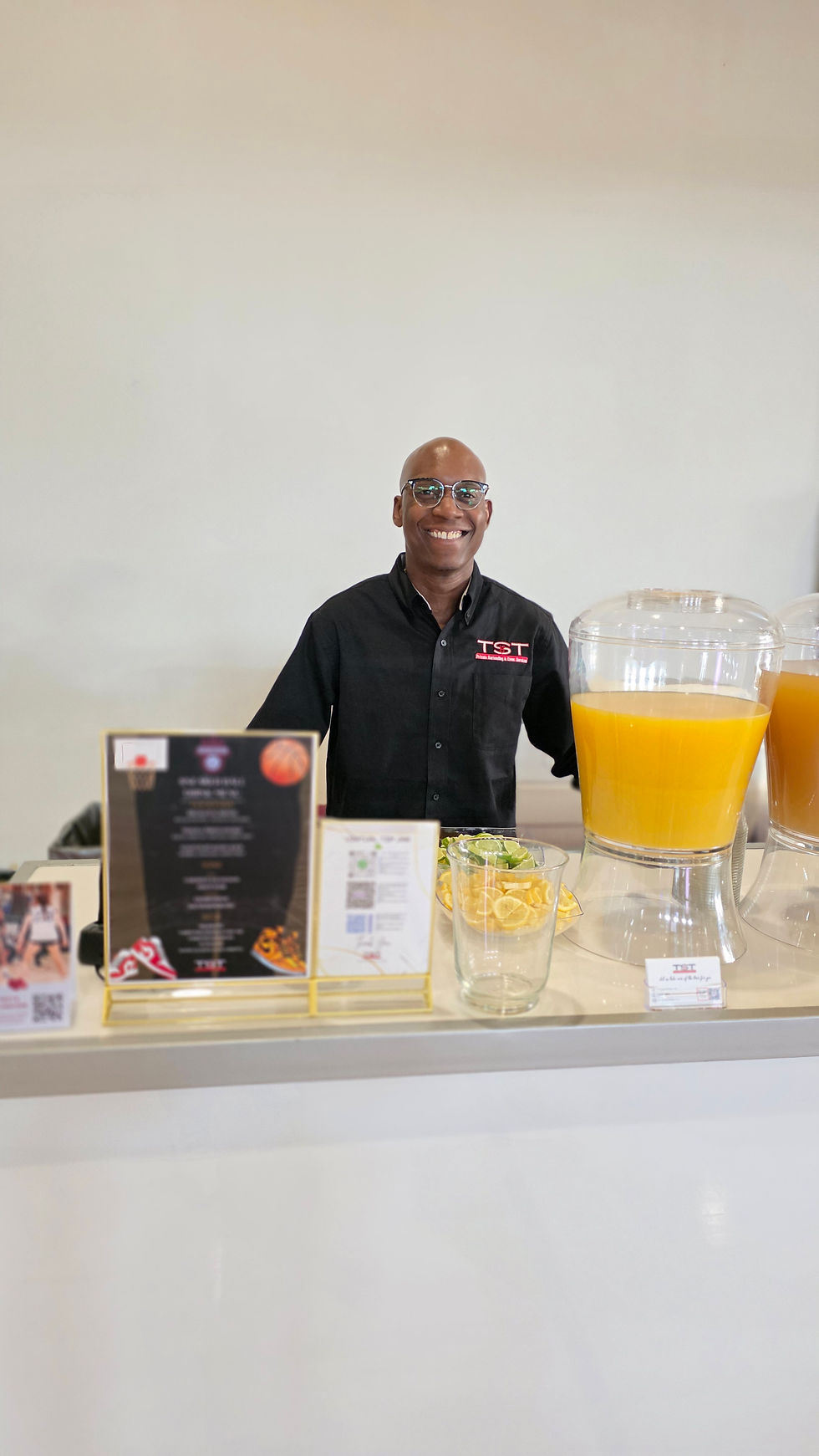 TopShelfTipsy bartender at juice and cocktail station during a corporate event in Philadelphia with