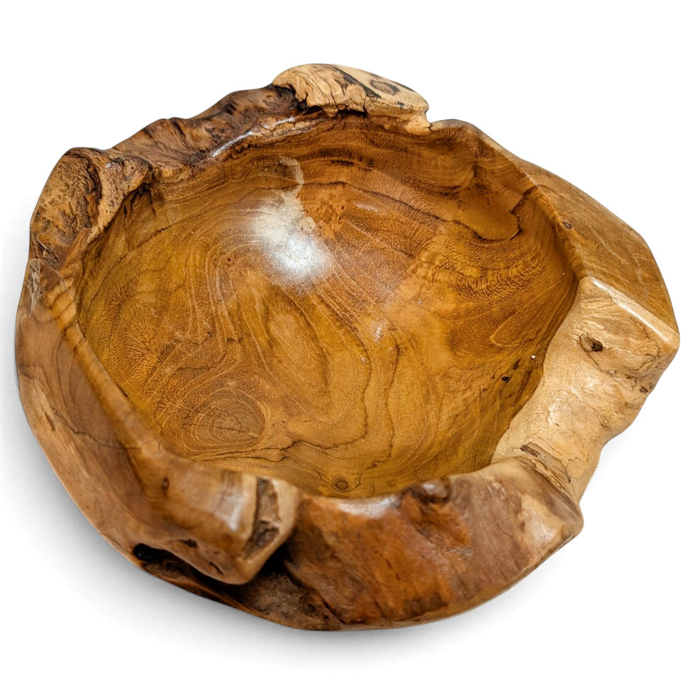 Angled view of a primitive teak key bowl with a thick organic rim