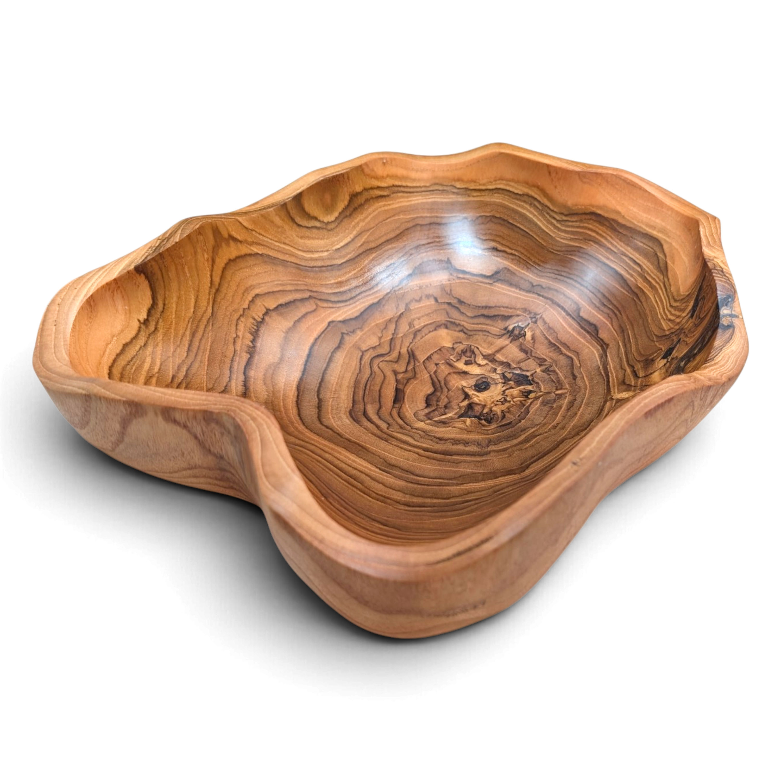 Artisan-crafted wavy-rim serving bowl made from teak