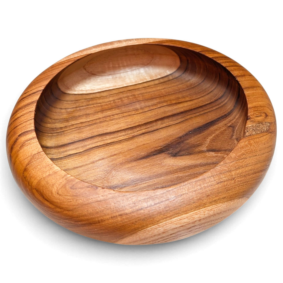 Artisan round teak appetizer bowl with warm coloring and visible grain