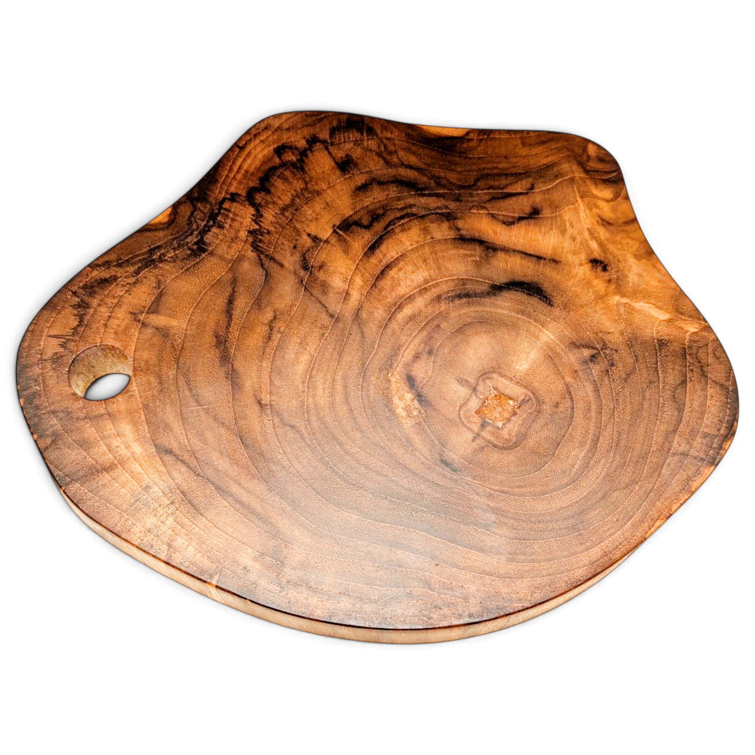 Angled view of a knot-grain teak serving board with an organic outline