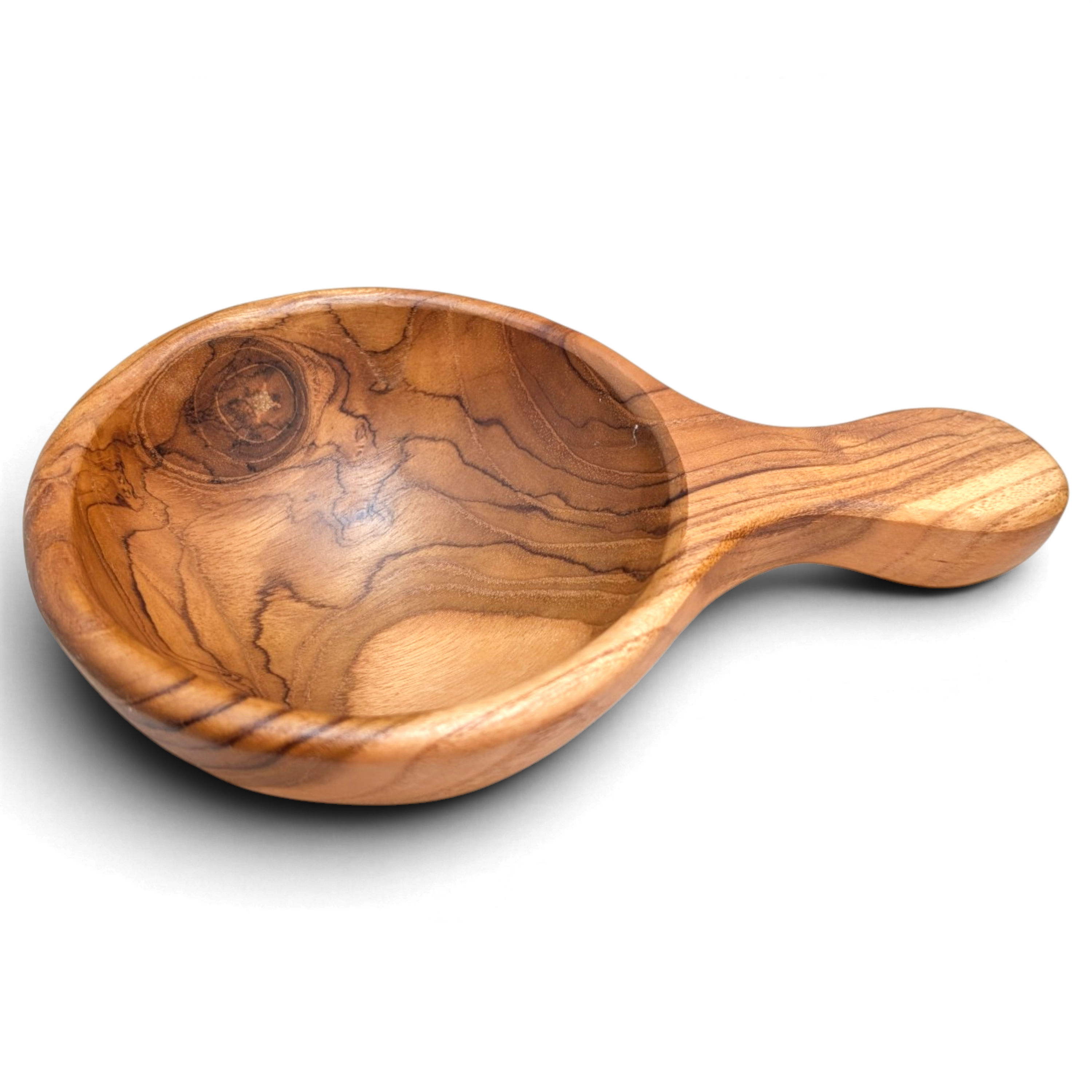 Angled view of a round-handle teak sauce bowl with a smoothly curved interior