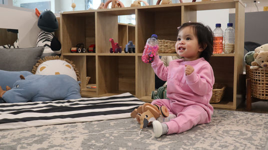 Toddler enjoying sensory play at Climbing Ladders Montessori Centre.