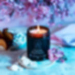 Yozakura 150g vegan soy candle with notes of cherry blossom, ripe plum, bubblegum, and soft vanilla in a sleek amber jar.