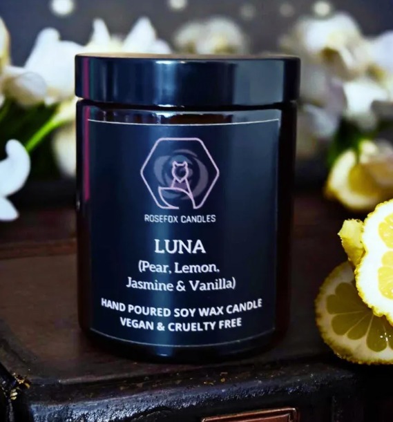 Luna scented candle. Juicy pear and lemon float over dreamy florals like iris, violet, and night-blooming jasmine.