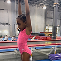 Young Gymnast preparing for a tumbling pass