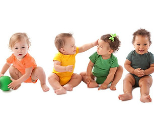 Diverse-group-of-ten-babies-playing-1574