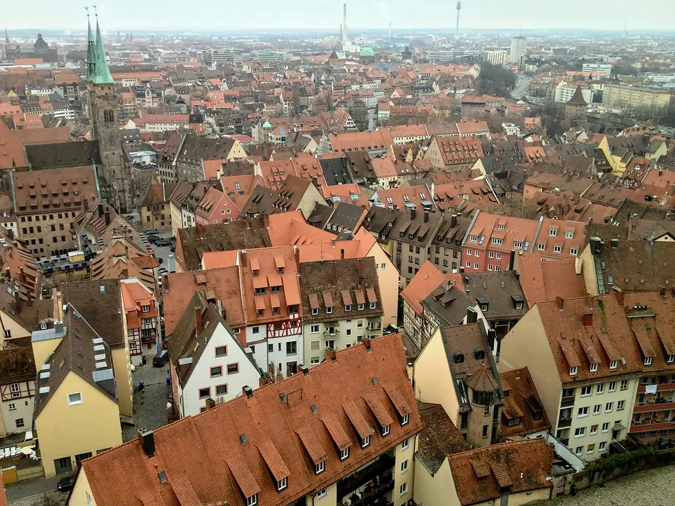 Red-tiled rooftops and church spires of a historic old town, private jet catering at Hof-Plauen Airport (HOQ / EDQM), Hof, Germany