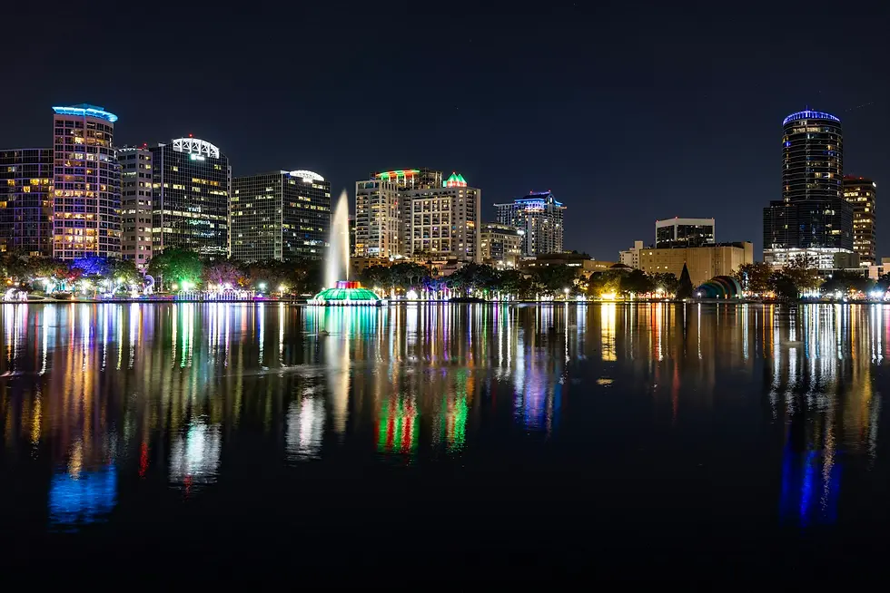 Night skyline and fountain reflected in a calm lake, private jet catering at Space Coast Regional Airport (TIX / KTIX), Titusville, United States