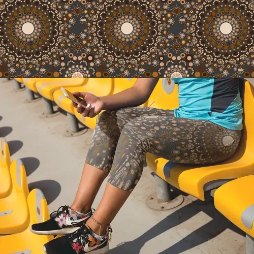 Thumbnail: Woman wearing capri sandstone leggings on eclipse base outside