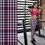 Thumbnail: Teenager wearing plaid navy leggings styled with casual sneakers