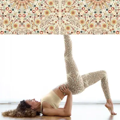 Thumbnail: Woman in XS-XL leggings with Apricot White mandala pattern posing outside