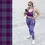 Thumbnail: Plus-size model in gingham leggings on phone