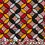Thumbnail: Vibrant geometric pattern with overlapping circles and ovals in red, orange, gray, and black.