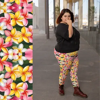 Thumbnail: Plus Size (2XL-6XL): A curvy woman posing in bold frangipani floral leggings with pockets.