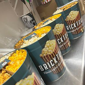 Bricktown Popcorn's Custom Tins filled with flavor