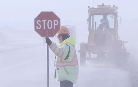 A flagger controls traffic on a Montana