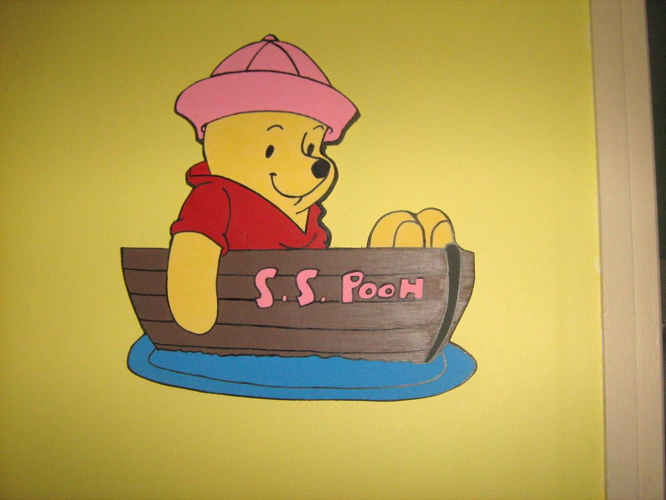 décor mural winnie l'ourson dans un bateau en bois fabrication artisanale