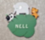 plaque de porte de chambre en bois forme feuille couleur verte décorée avec un éléphant, un panda et un lion dessus
