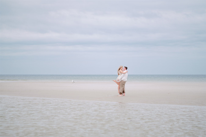 engagement session on Mayflower beach during low tide