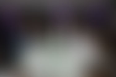 photo of guests at table at wedding reception 