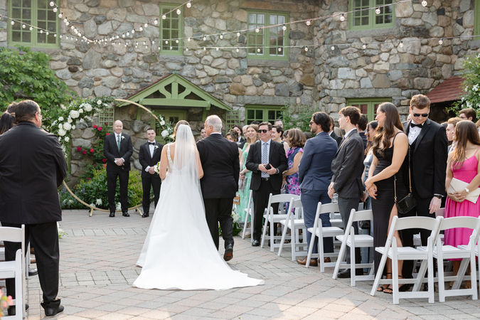 bride walking down aisle at willowdale estate wedding ceremony