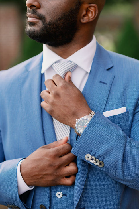 groom portraits at lynch park rose garden