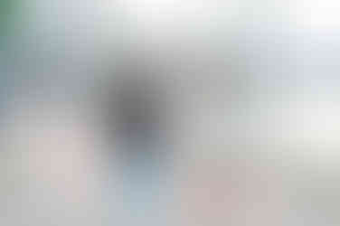 girl admiring engagement ring in boston seaport