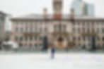 couple ice skating on oval at worcester city hall