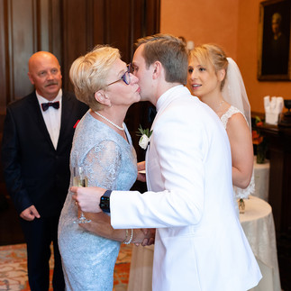wedding candids at cocktail hour at harvard club of boston