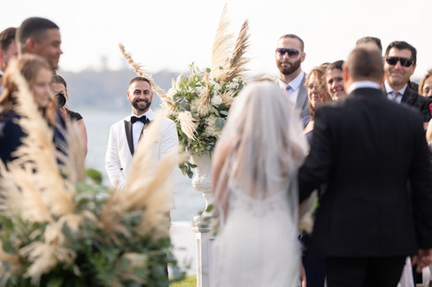 Groom’s face when bride walks down the aisle