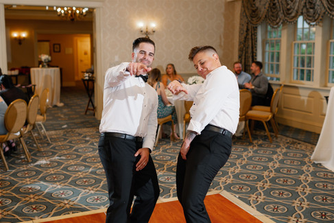 candid photo of bride with best man