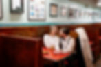 couple shares booth at george's coney island