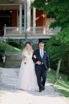 Bride walking down the aisle with her father