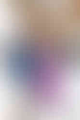 groom's mom pinning on his boutonniere