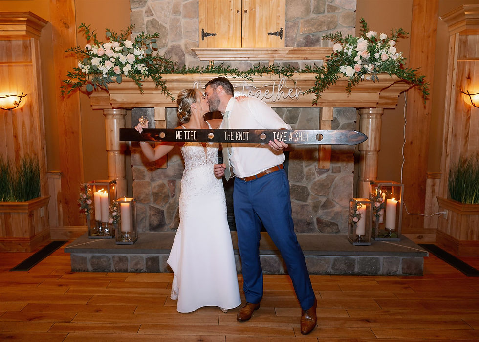 The Barn at Outlook Wedding Reception Bride and groom shot ski