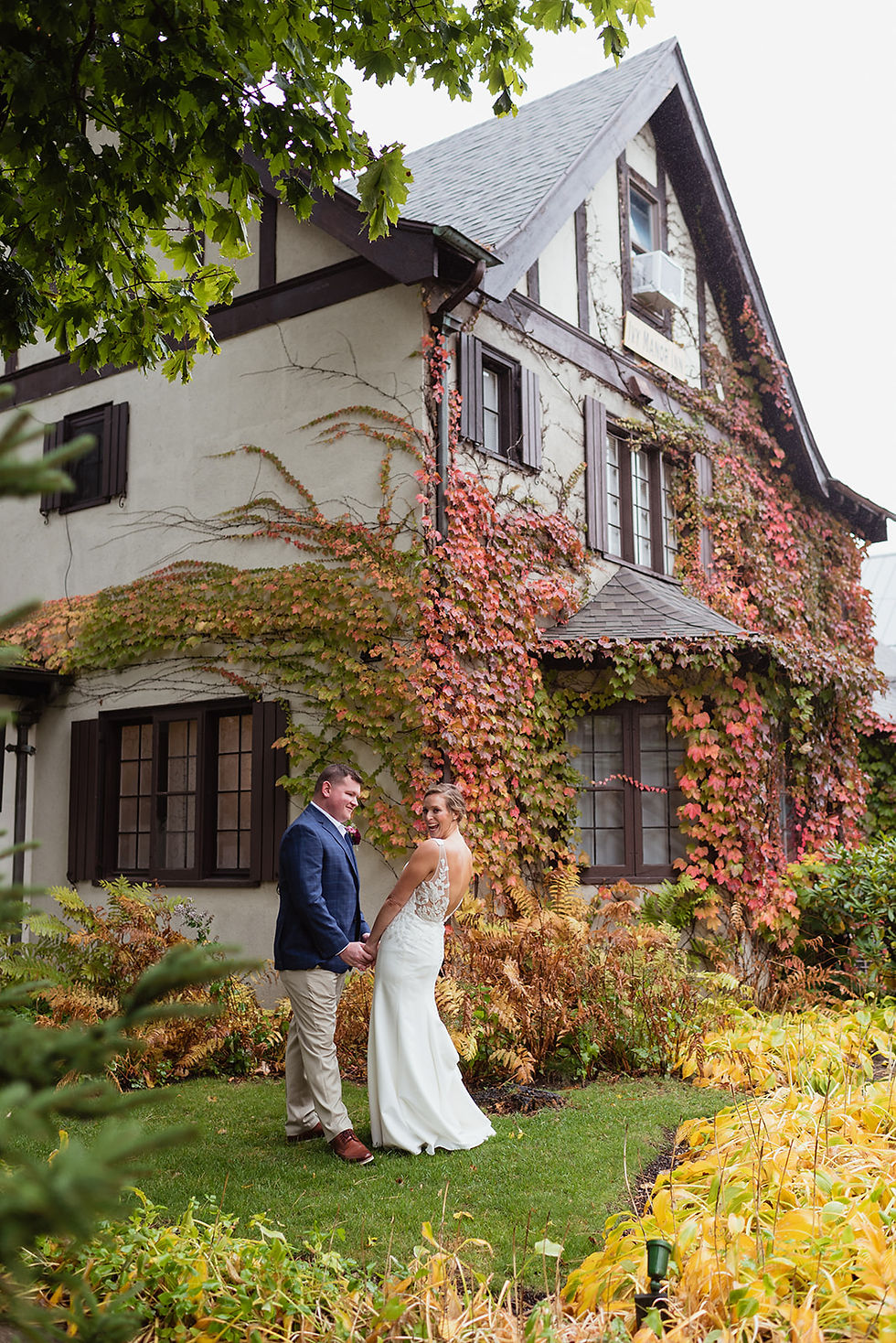 candid photo of couple outside Ivy Manor Inn