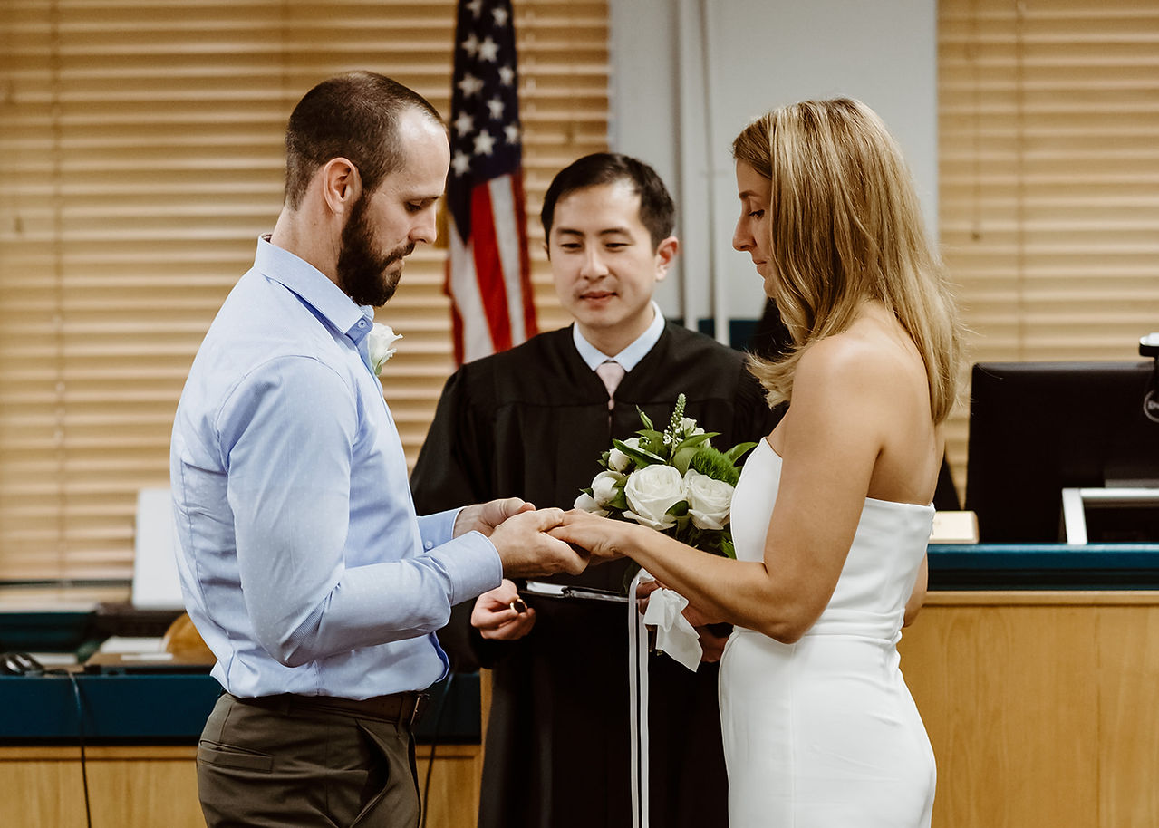 ring exchange during travis county courthouse wedding