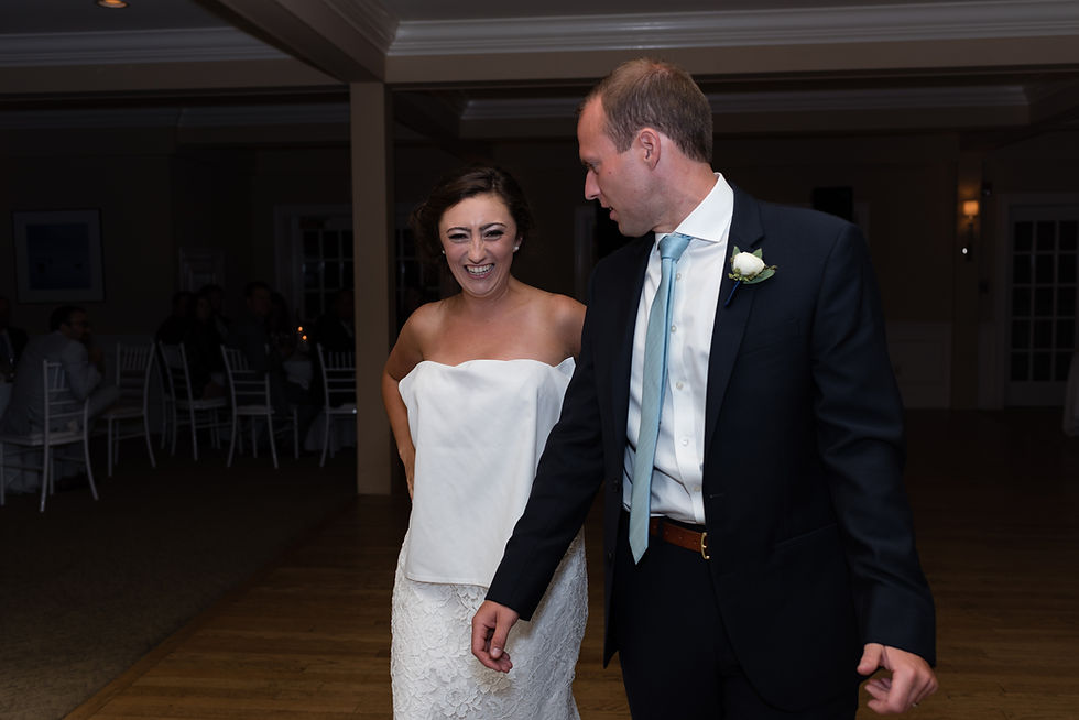 candid photo of couple during wedding at brookside country club
