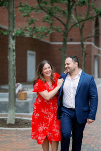 candid photo of newly engaged couple