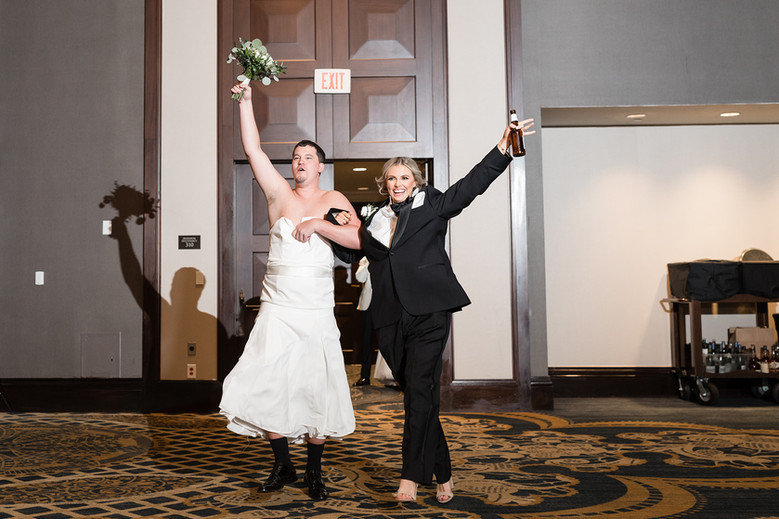 bride-and-groom-switch-outfits-for-wedding-reception-entrance.jpg