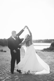 black and white newlywed photo on beach at red jacket resort in cape cod