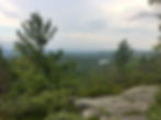 summit view from peaked mountain