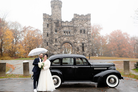 rainy elopement with vintage car