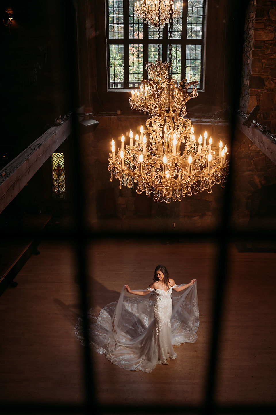 bridal photo from second balcony into ballroom at bill millers castle