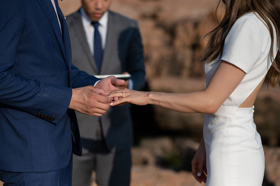 ring exchange during elopement wedding ceremony