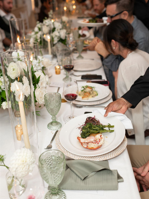 dinner service plates being set down